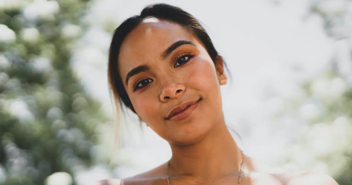 A photo of a Filipina smiling.