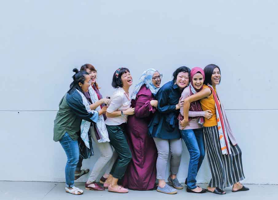 A group photo of happy Singaporean women.